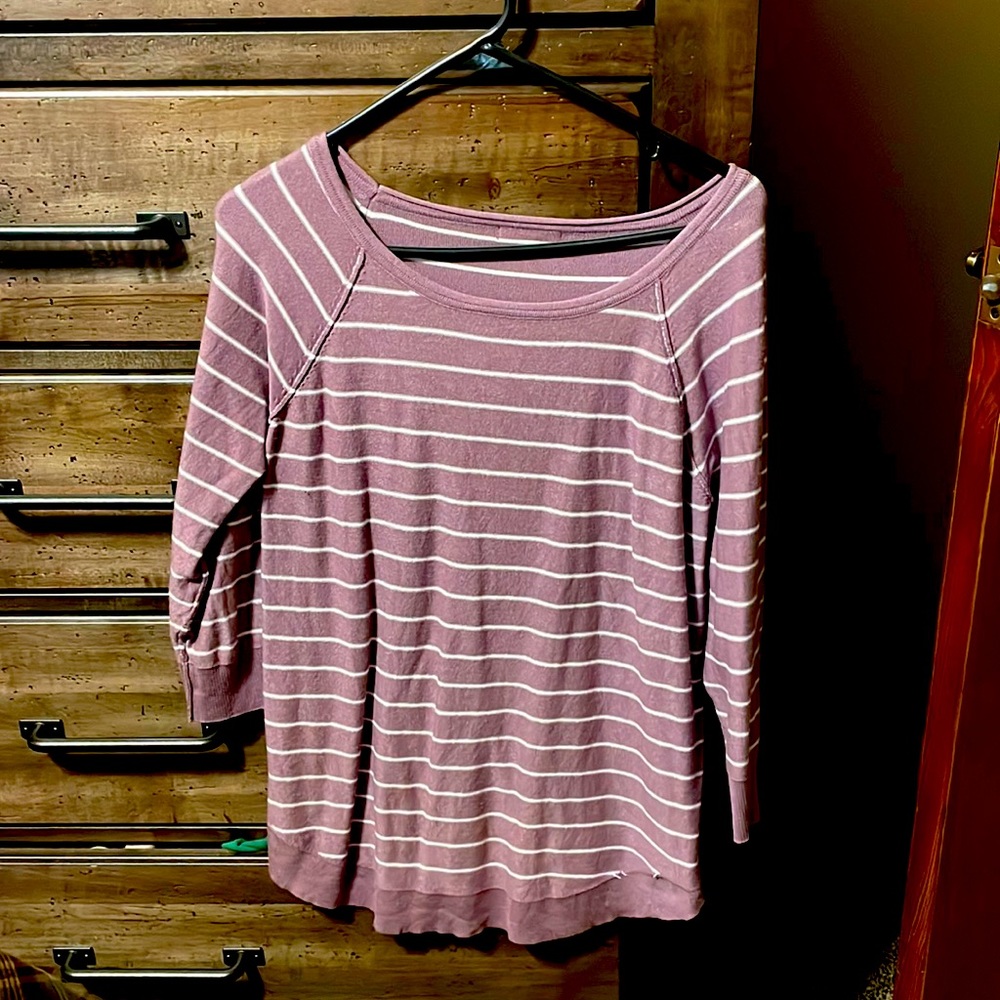 Pink Clover curved hem sweater